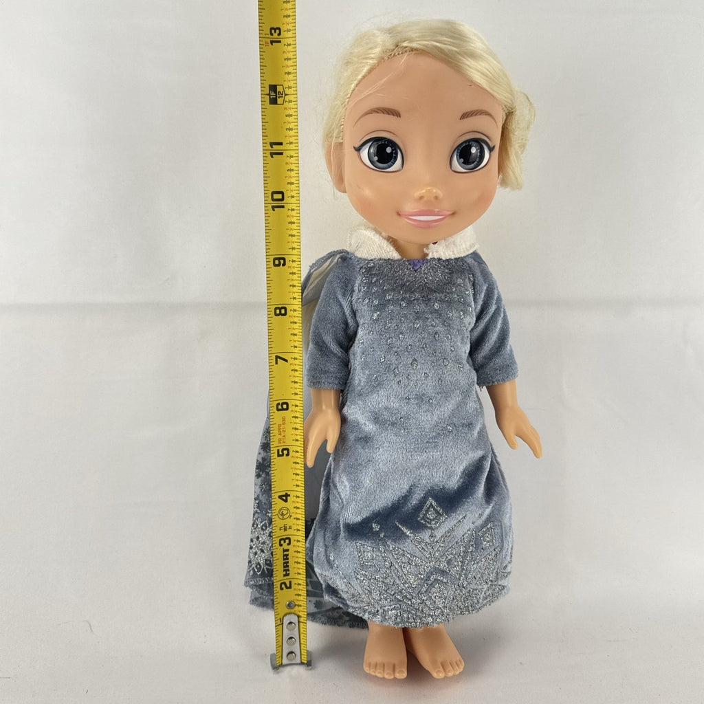 JAKKS Pacific Disney Frozen Elsa 13-inch toddler doll wearing blue winter dress with faux fur trim