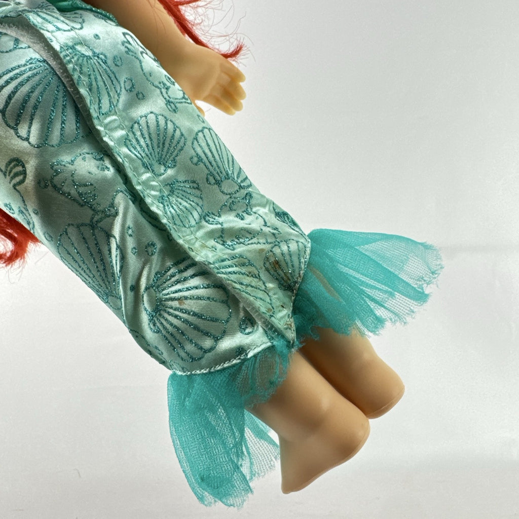 Disney Princess Ariel 13-inch vinyl toddler play doll wearing teal and purple mermaid dress