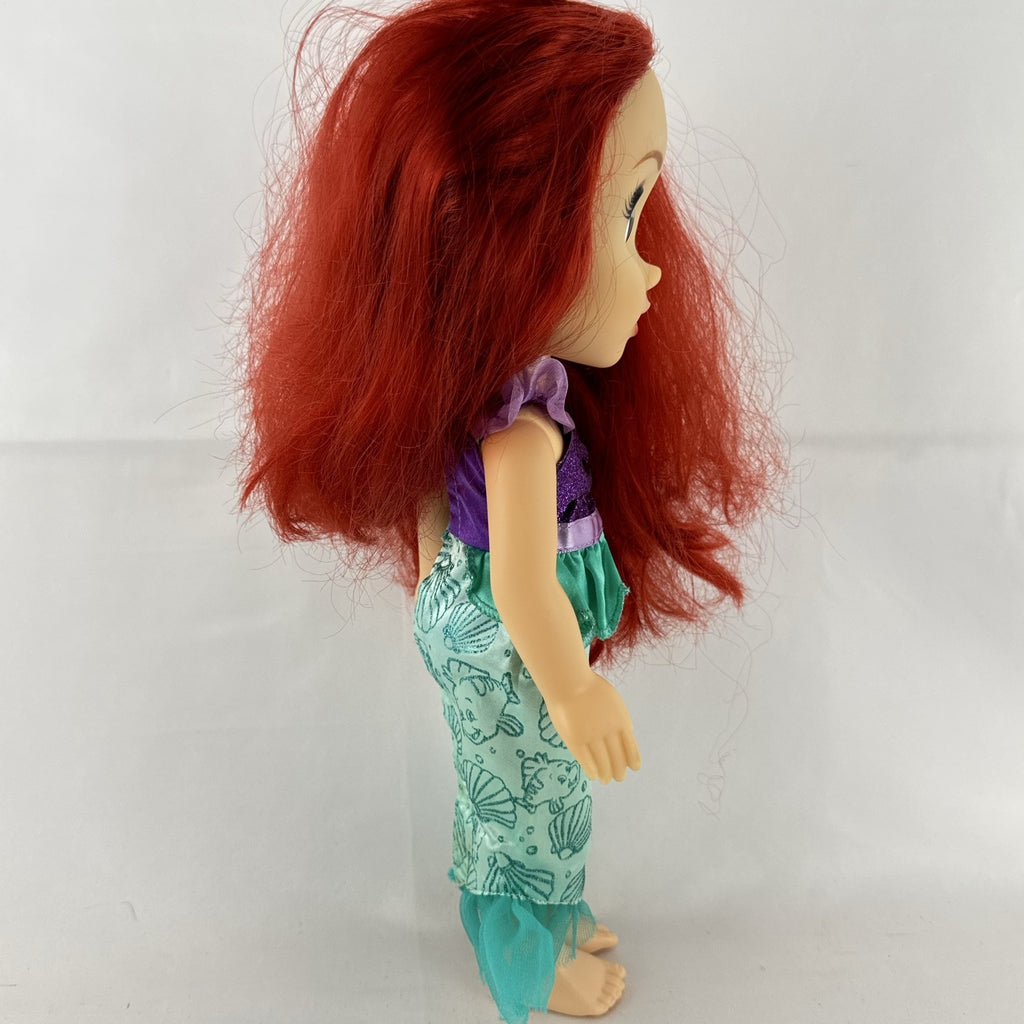 Disney Princess Ariel 13-inch vinyl toddler play doll wearing teal and purple mermaid dress