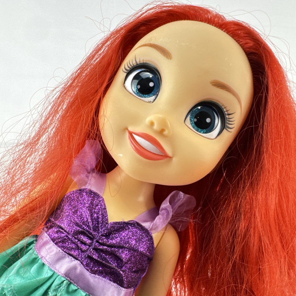 Disney Princess Ariel 13-inch vinyl toddler play doll wearing teal and purple mermaid dress
