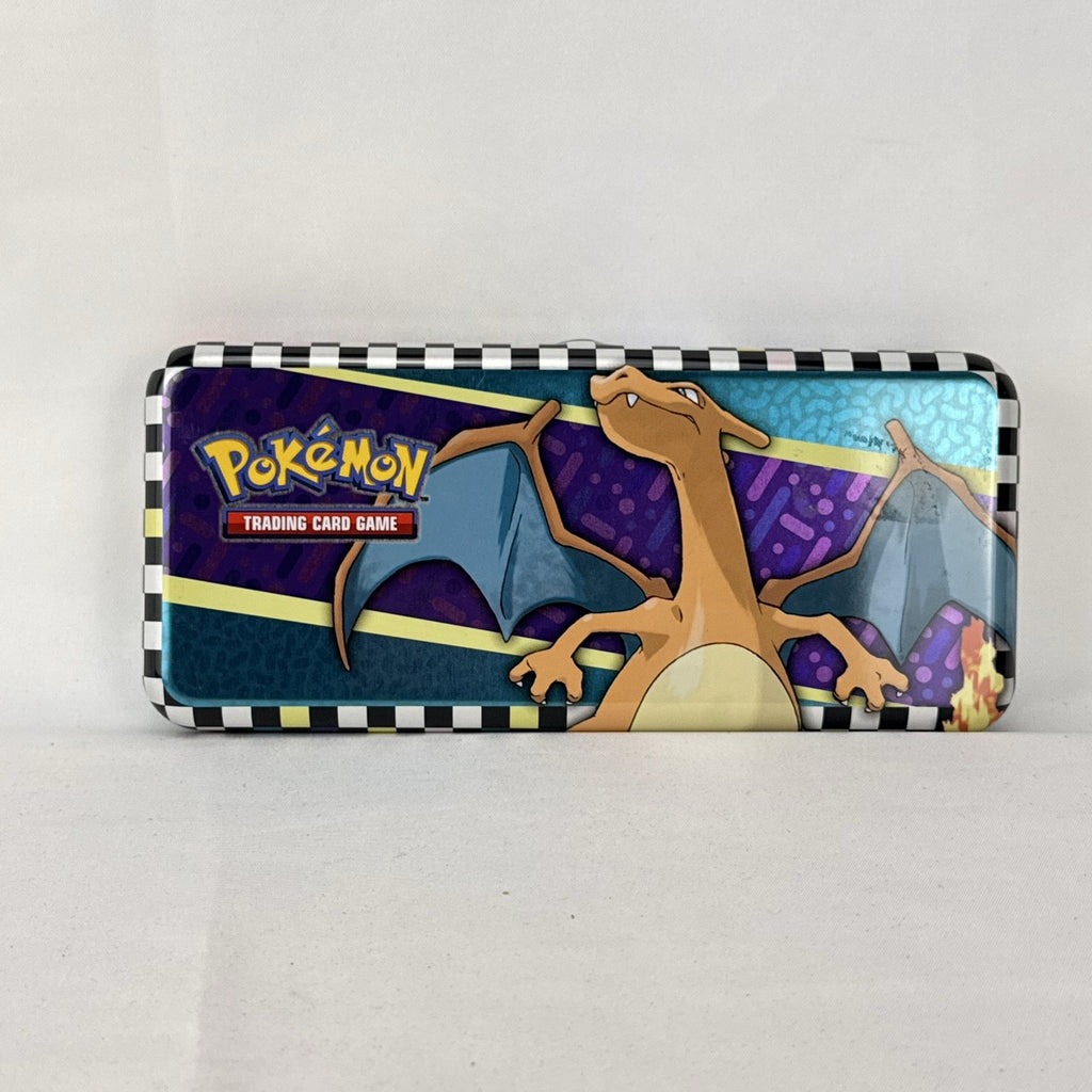 Pokémon 2024 embossed metal pencil tin featuring Charizard, Koraidon, and Miraidon