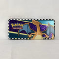 Pokémon 2024 embossed metal pencil tin featuring Charizard, Koraidon, and Miraidon