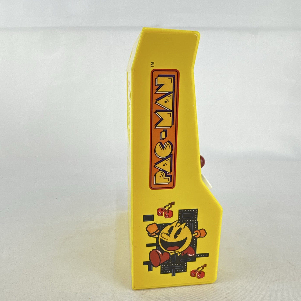 Basic Fun Pac-Man mini arcade cabinet handheld electronic game in yellow with LCD screen