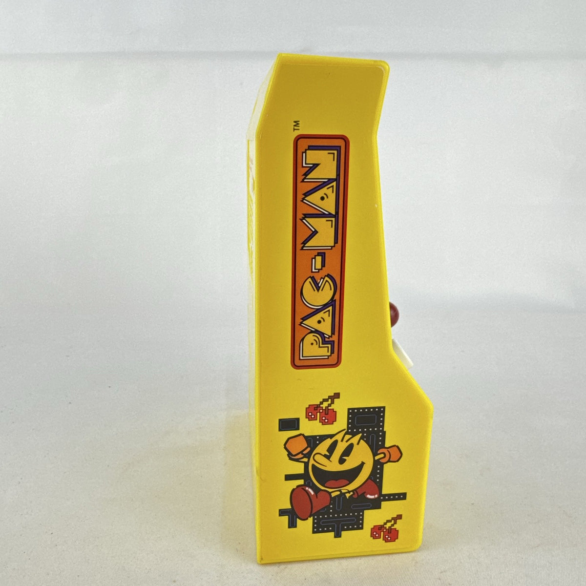 Basic Fun Pac-Man mini arcade cabinet handheld electronic game in yellow with LCD screen