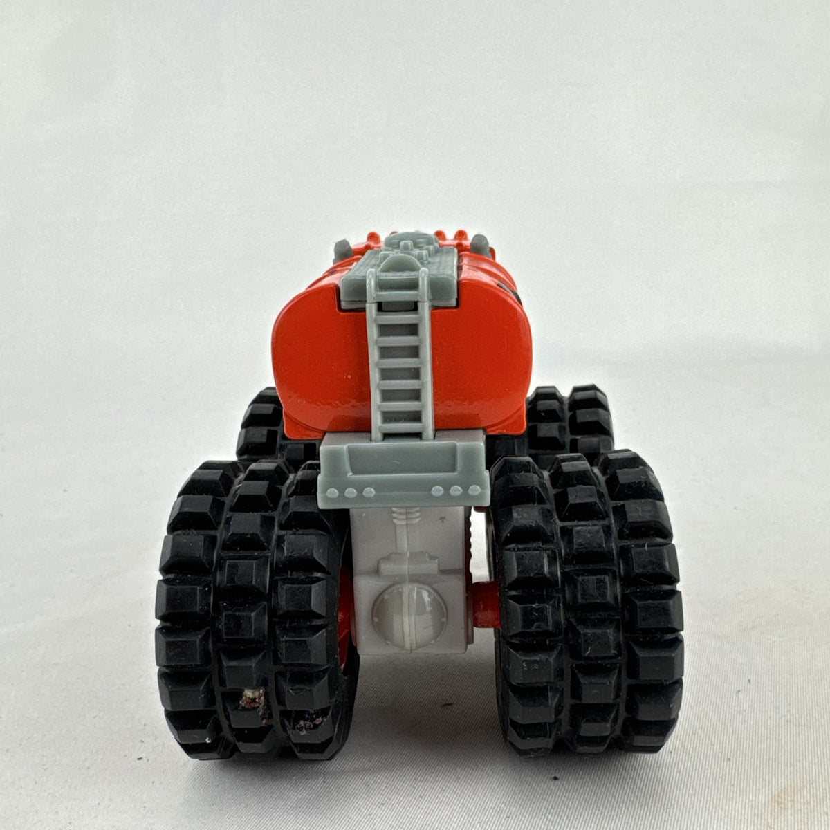 Tonka monster truck 8-wheel dually fuel tanker diecast vehicle in bright orange with flame graphics