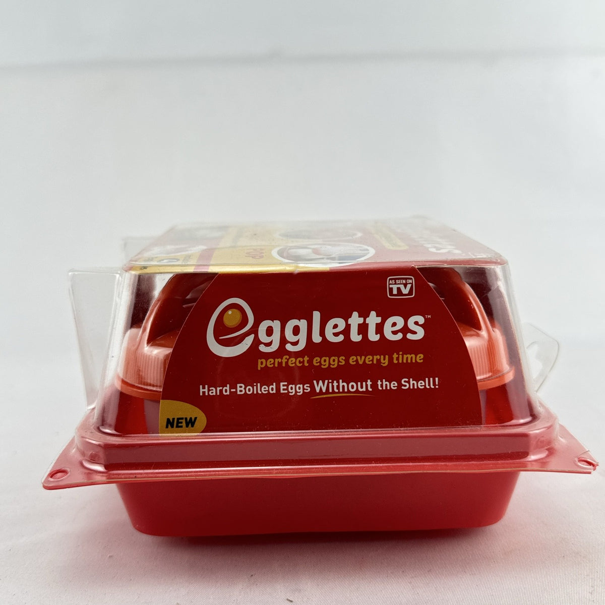 Egglettes 4-pack silicone stovetop egg cooking pods in original sealed packaging.