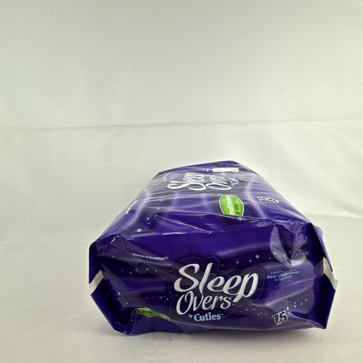 Sealed 15-count package of Cuties SleepOvers youth nighttime underwear in size Small/Medium.