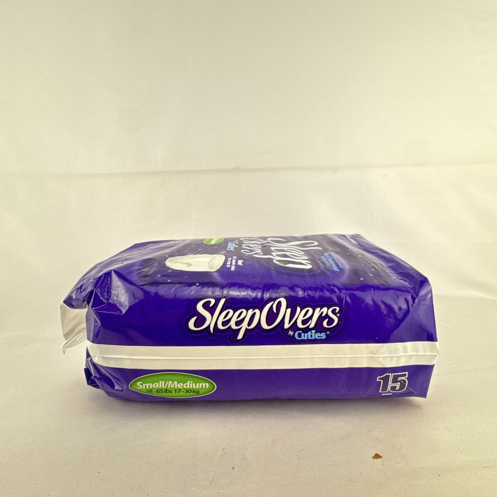 Factory sealed package of Cuties SleepOvers unisex youth overnight pants in size small medium 15 count