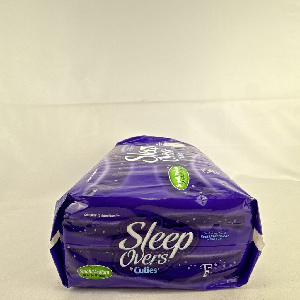 Factory sealed package of Cuties SleepOvers unisex youth overnight pants in size small medium 15 count