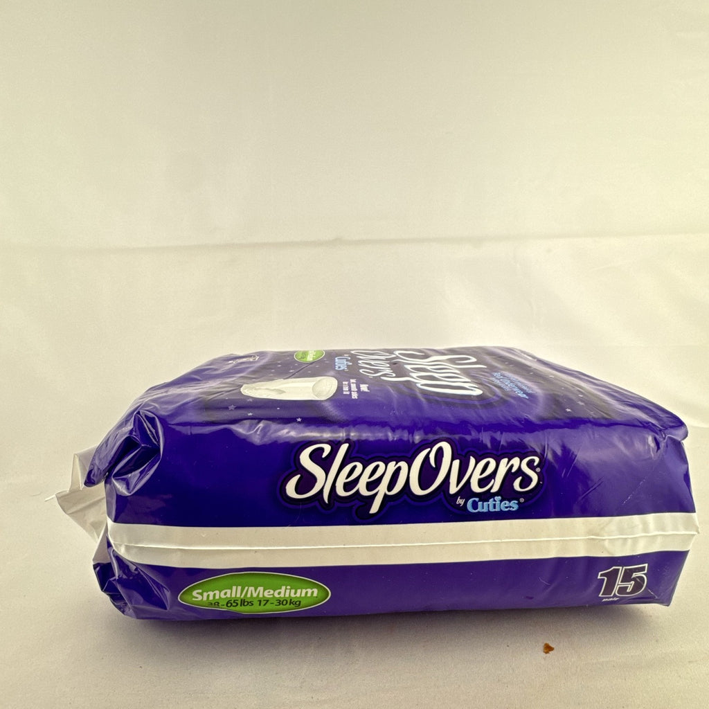 Factory sealed package of Cuties SleepOvers unisex youth overnight pants in size small medium 15 count