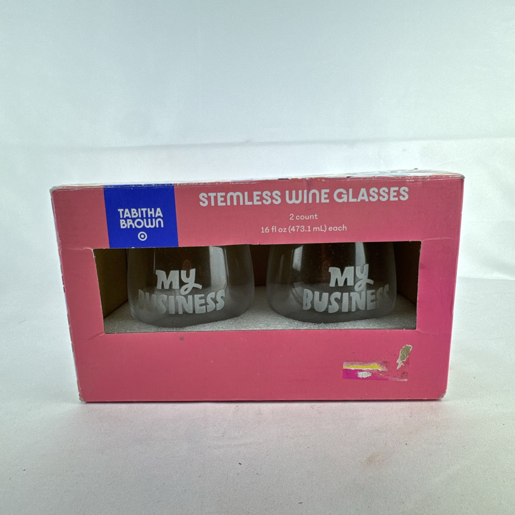 Set of two Tabitha Brown for Target clear stemless wine glasses with white My Business graphic in original box.