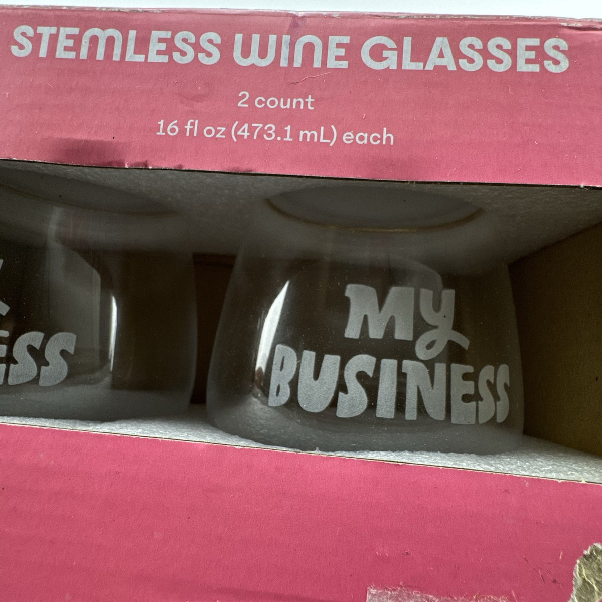 Set of two Tabitha Brown for Target clear stemless wine glasses with white My Business graphic in original box.