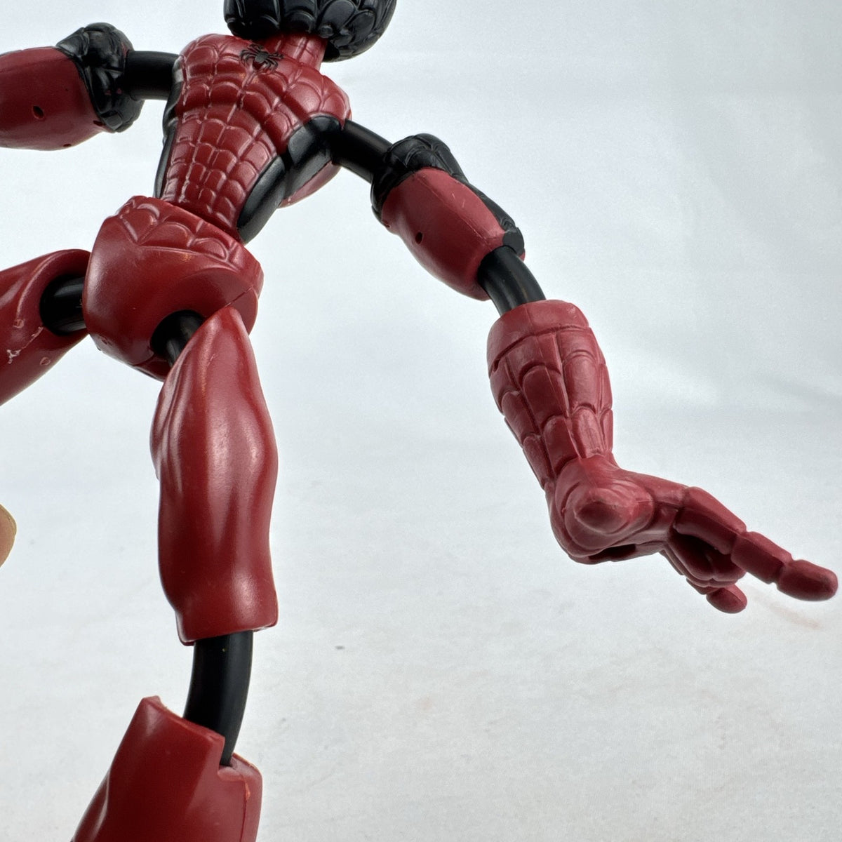 Hasbro Marvel Bend and Flex Miles Morales 6-inch bendable action figure in red and black suit.