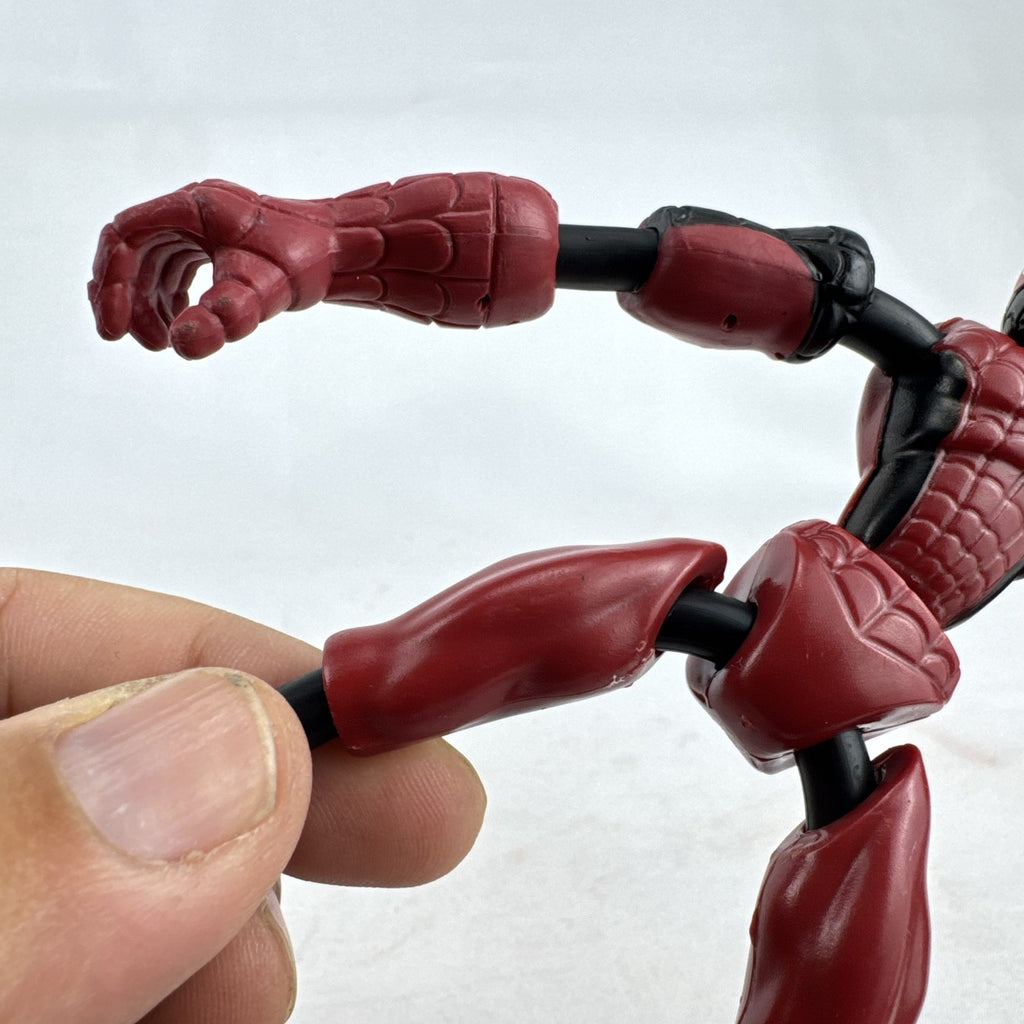 Hasbro Marvel Bend and Flex Miles Morales 6-inch bendable action figure in red and black suit.