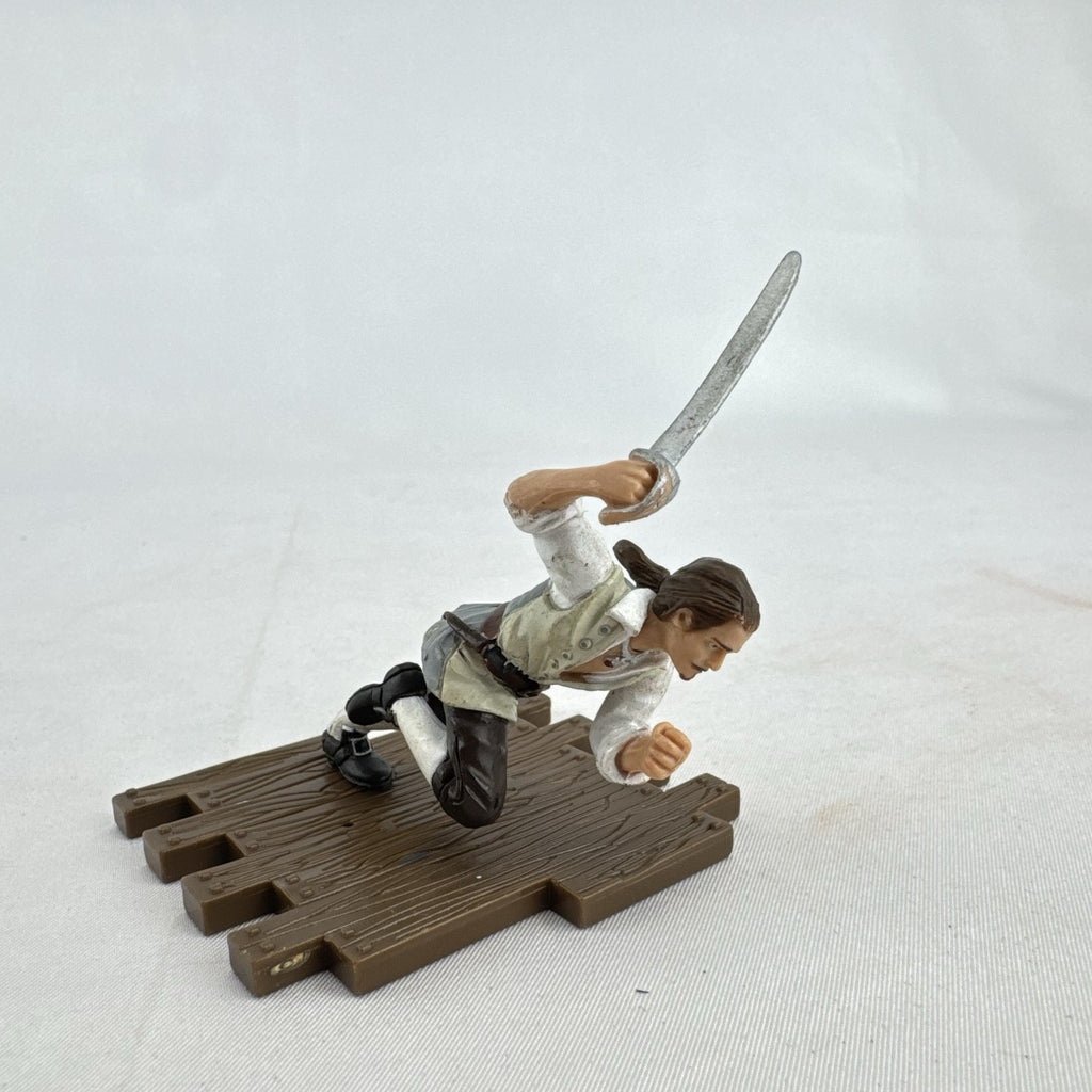 Disney Pirates of the Caribbean Will Turner mini PVC figure with cutlass on wooden dock base