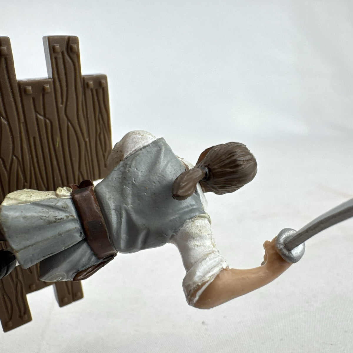 Disney Pirates of the Caribbean Will Turner mini PVC figure with cutlass on wooden dock base