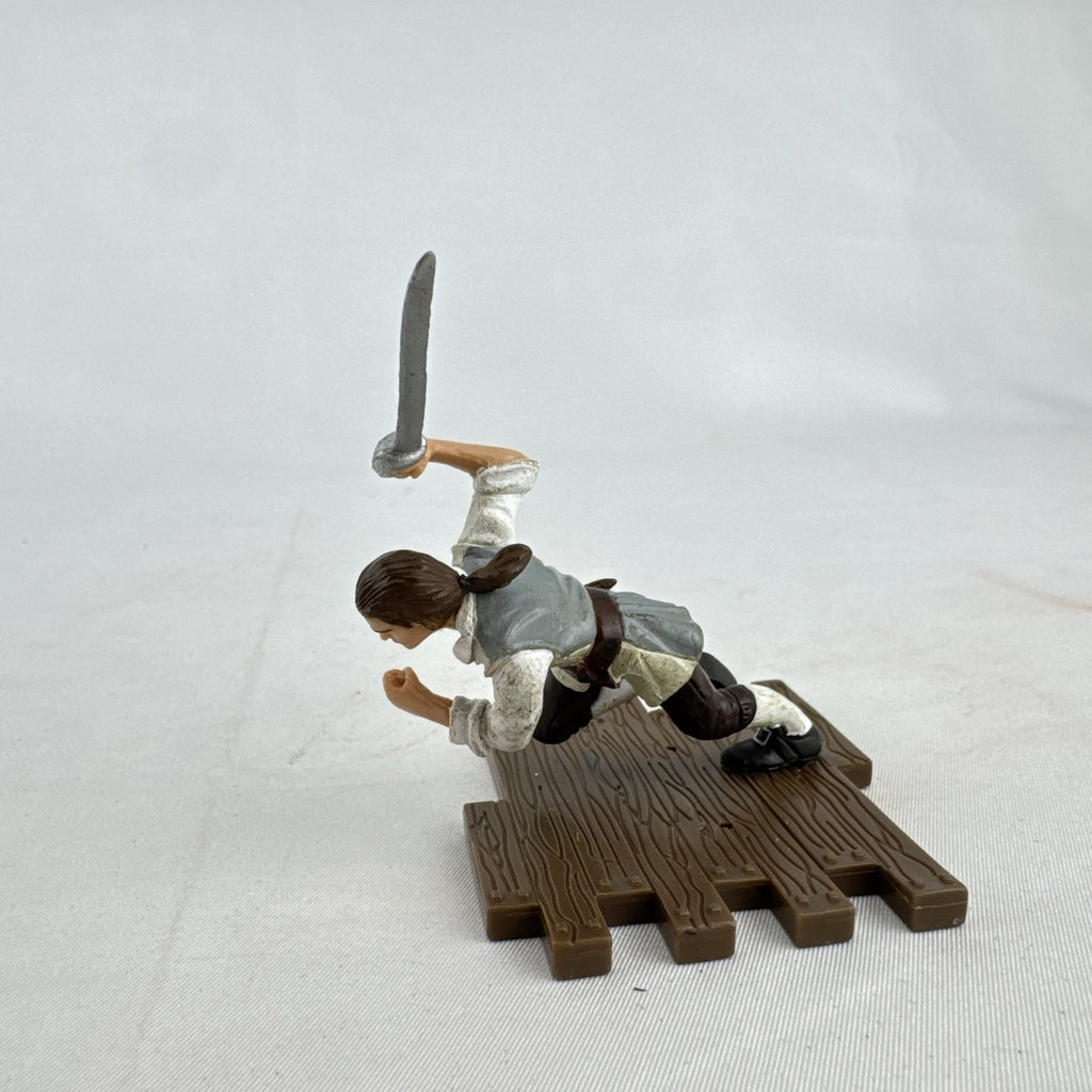 Disney Pirates of the Caribbean Will Turner mini PVC figure with cutlass on wooden dock base