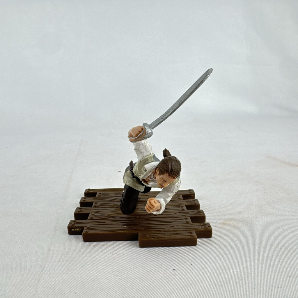 Disney Pirates of the Caribbean Will Turner mini PVC figure with cutlass on wooden dock base