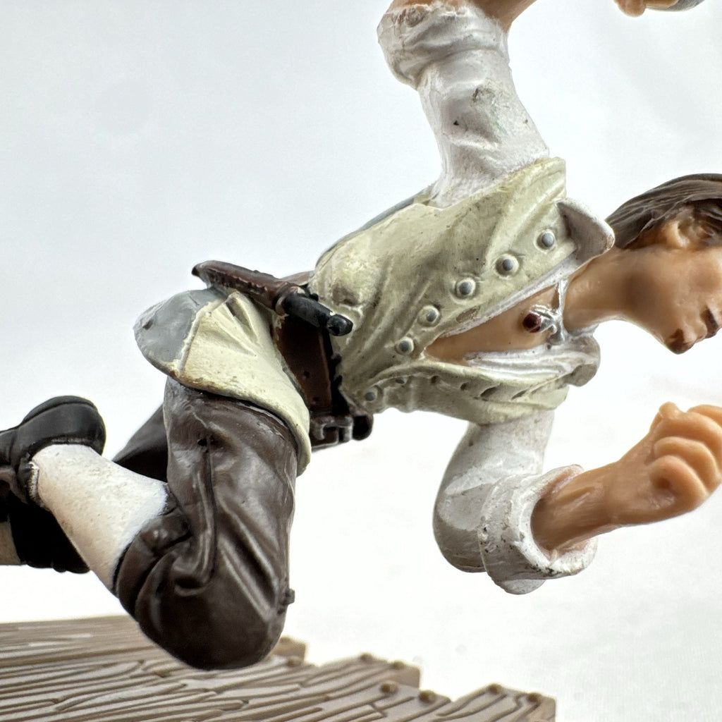 Disney Pirates of the Caribbean Will Turner mini PVC figure with cutlass on wooden dock base