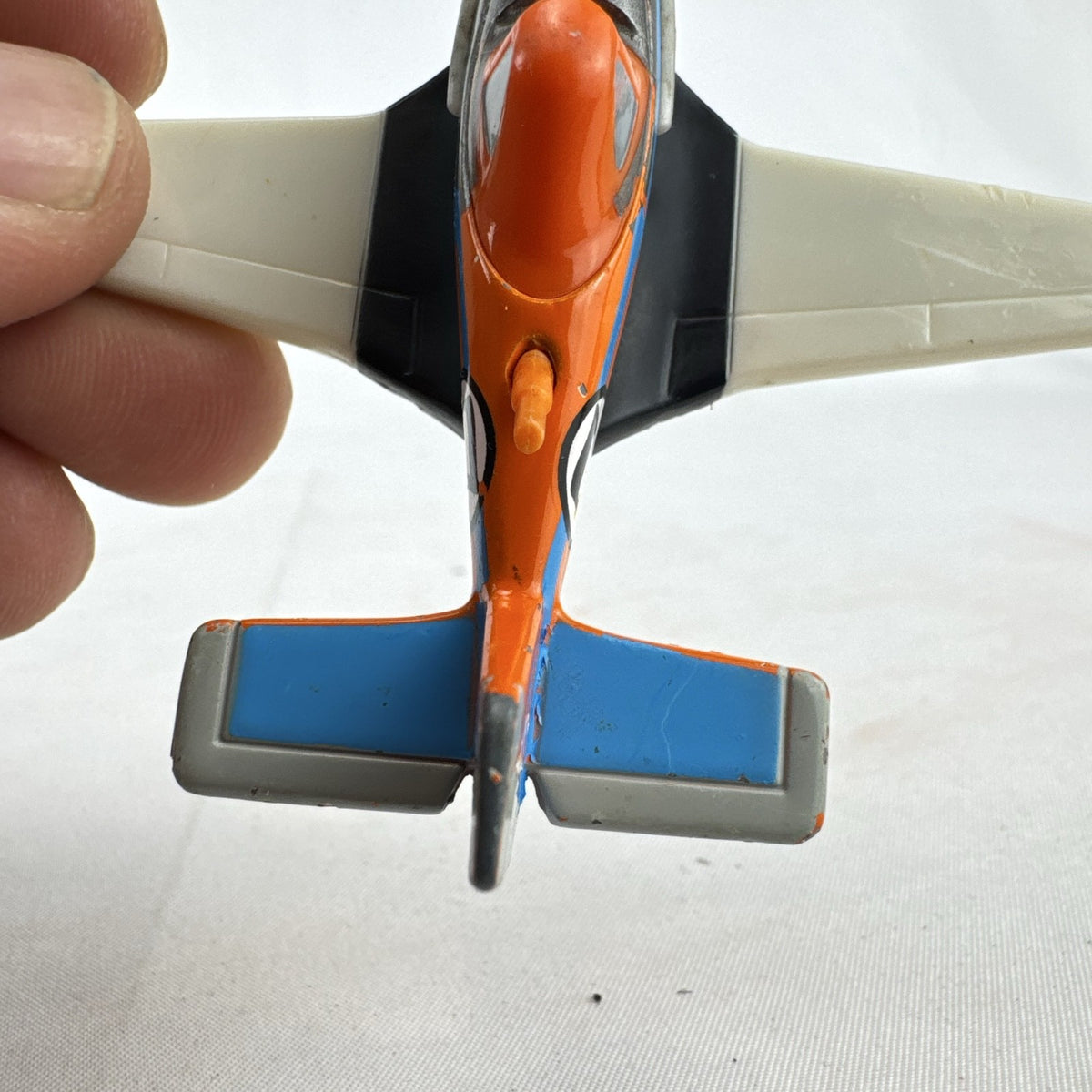 Mattel Disney Planes 1:55 scale diecast Dusty Crophopper toy airplane in Jolly Wrenches livery
