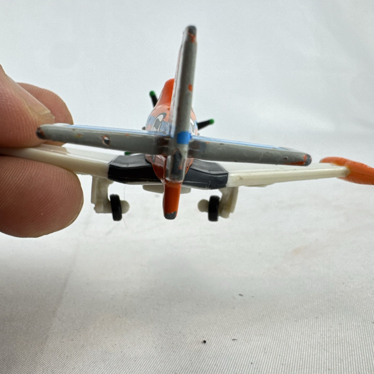 Mattel Disney Planes 1:55 scale diecast Dusty Crophopper toy airplane in Jolly Wrenches livery