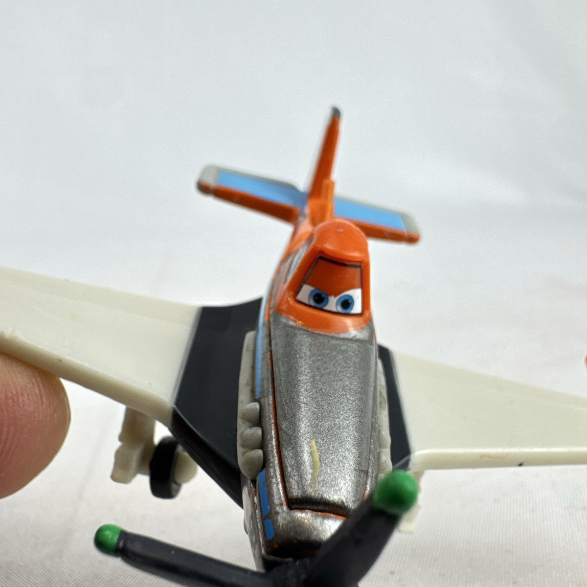 Mattel Disney Planes 1:55 scale diecast Dusty Crophopper toy airplane in Jolly Wrenches livery