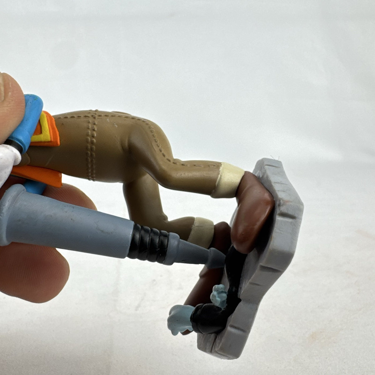 Disney Goofy construction worker PVC figurine holding a jackhammer and wearing a hard hat