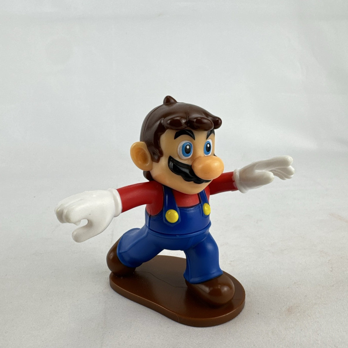 McDonald's Nintendo 2018 Super Mario Odyssey hatless Mario 3.5-inch plastic figure on brown base