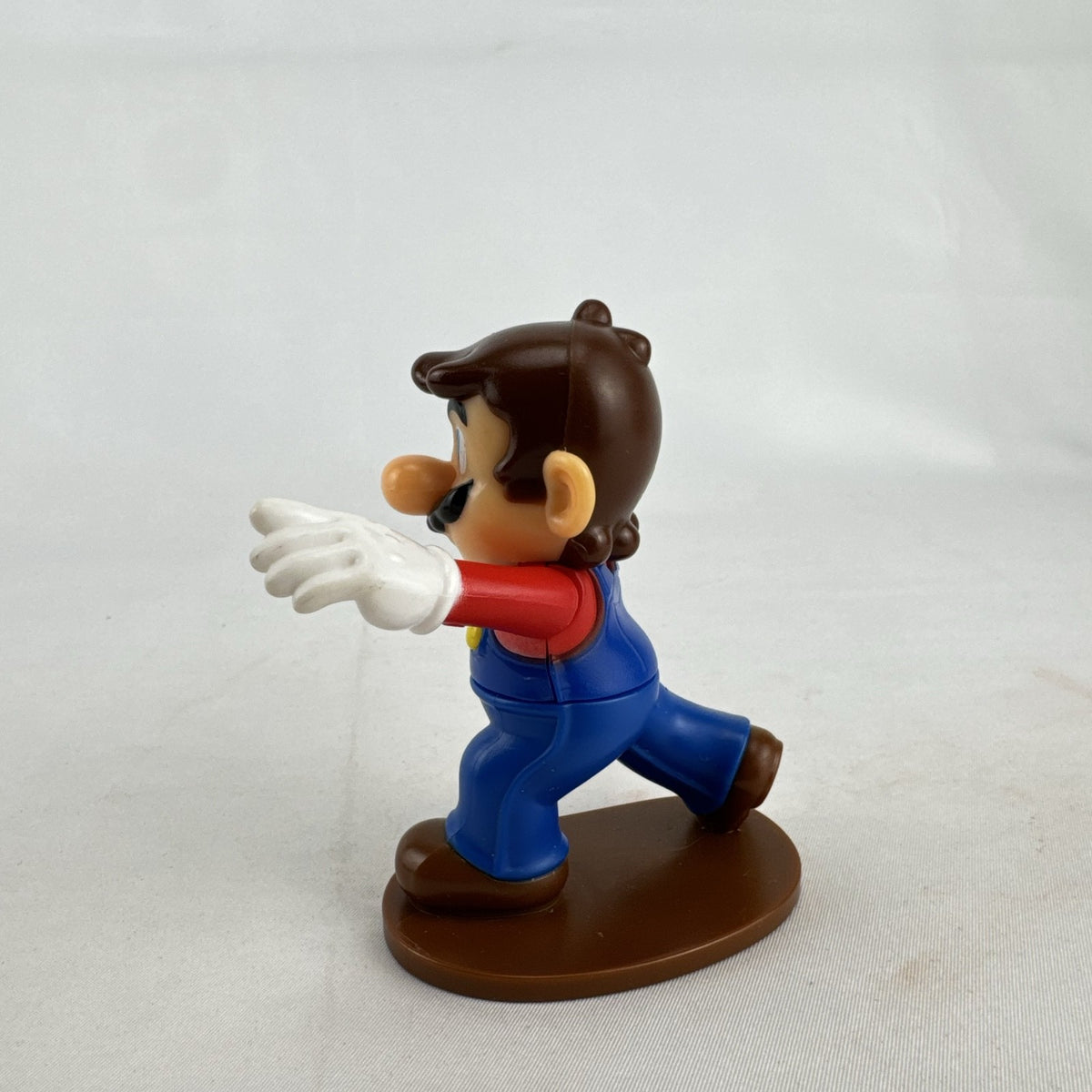 McDonald's Nintendo 2018 Super Mario Odyssey hatless Mario 3.5-inch plastic figure on brown base