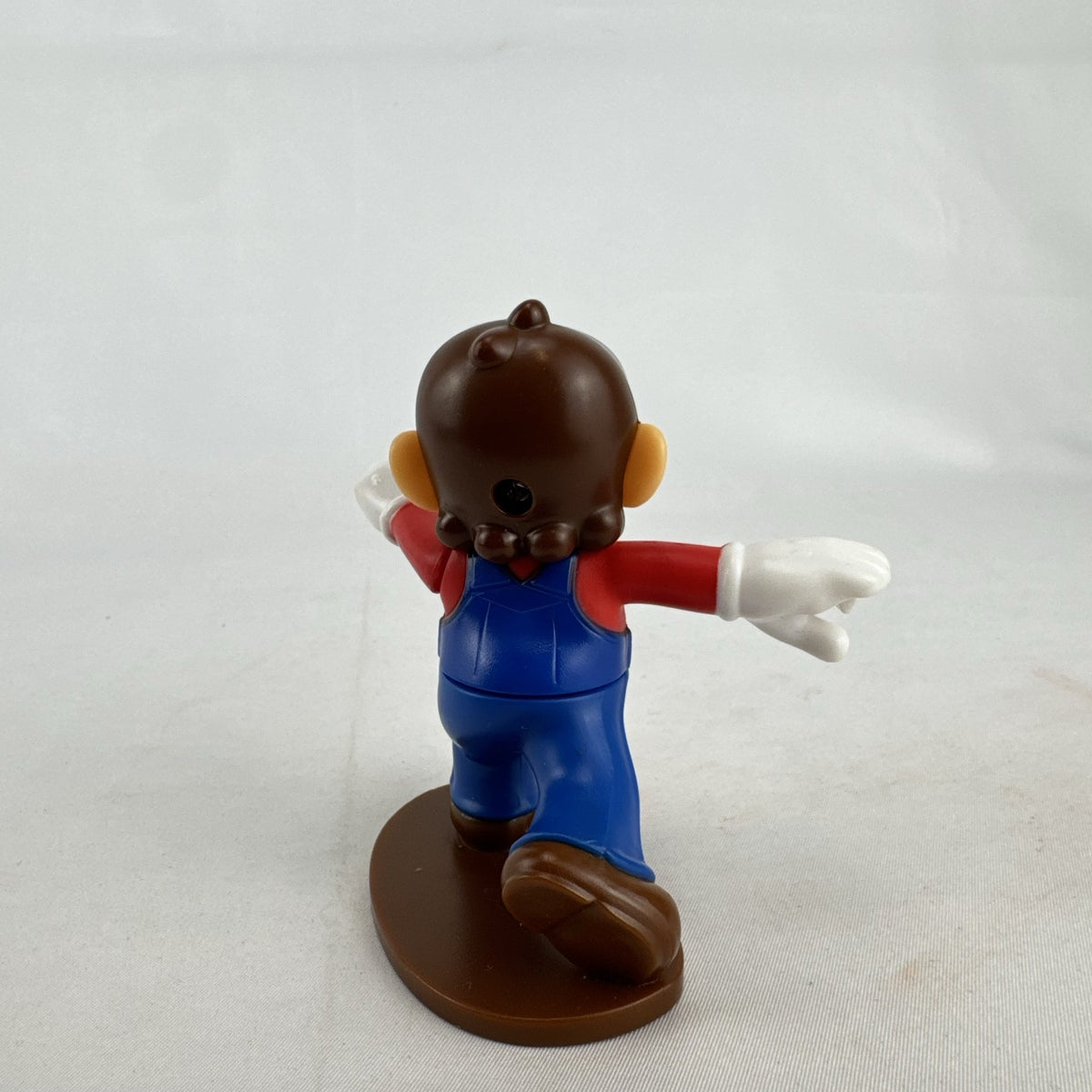 McDonald's Nintendo 2018 Super Mario Odyssey hatless Mario 3.5-inch plastic figure on brown base