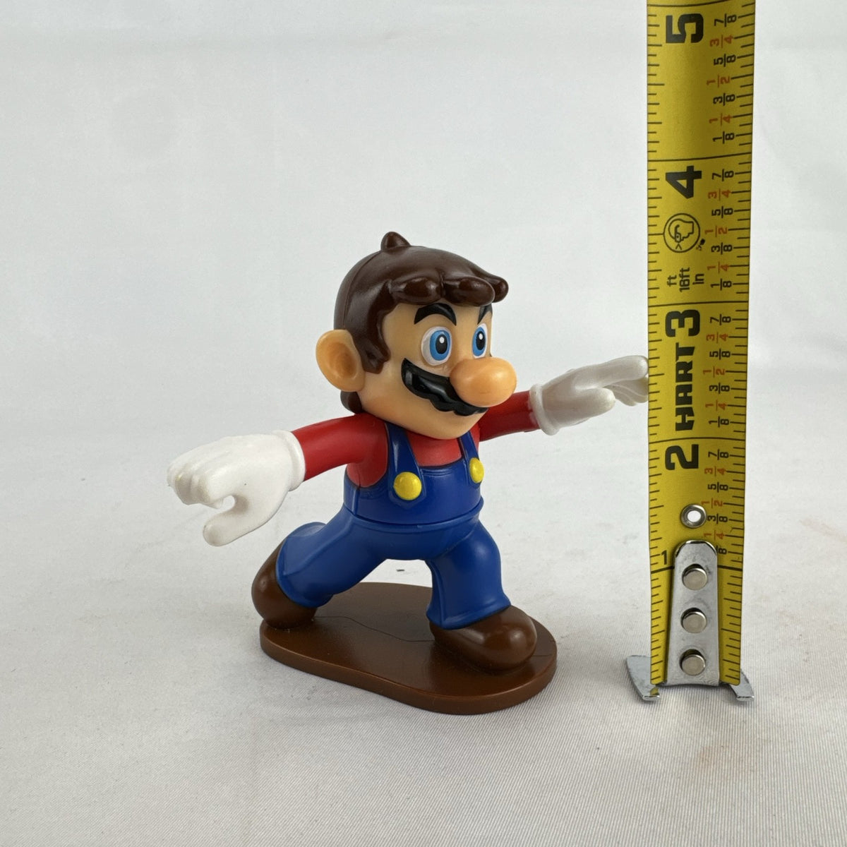 McDonald's Nintendo 2018 Super Mario Odyssey hatless Mario 3.5-inch plastic figure on brown base