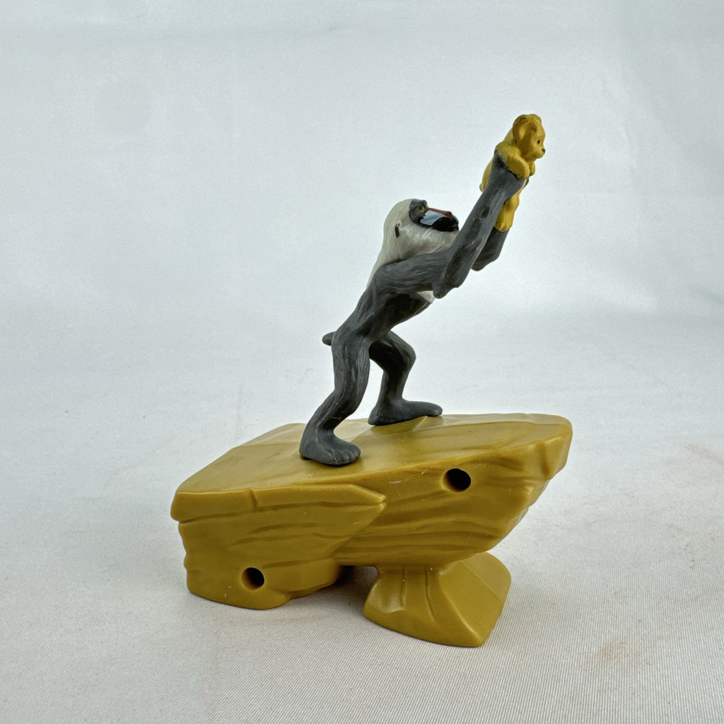 Disney Lion King 2019 McDonald's Happy Meal figure of Rafiki holding baby Simba atop Pride Rock