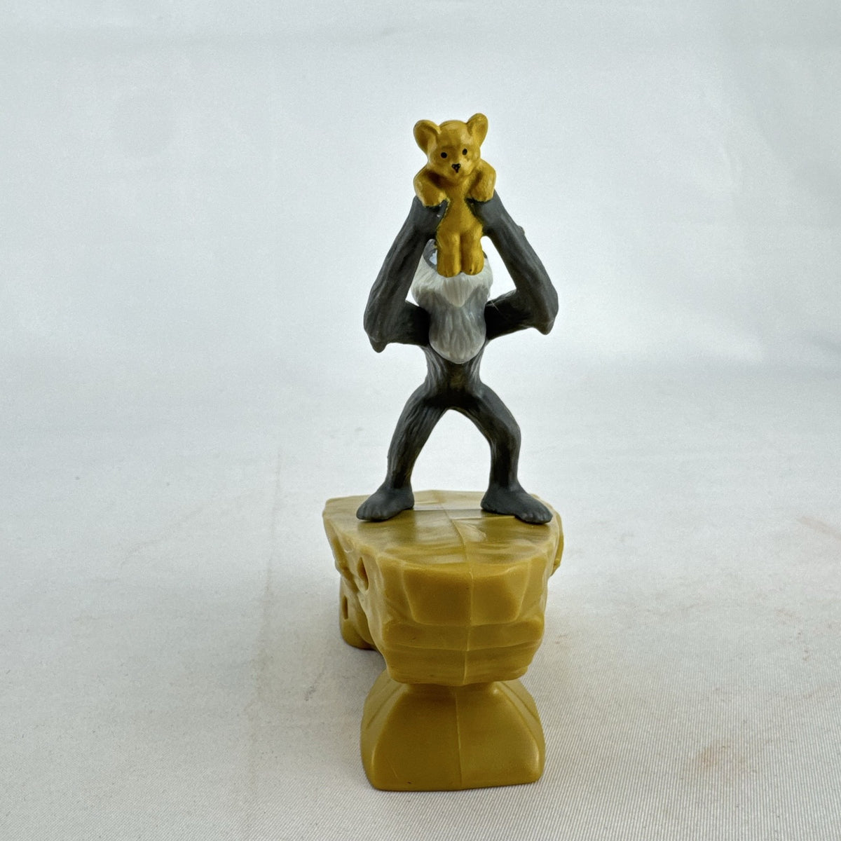 Disney Lion King 2019 McDonald's Happy Meal figure of Rafiki holding baby Simba atop Pride Rock