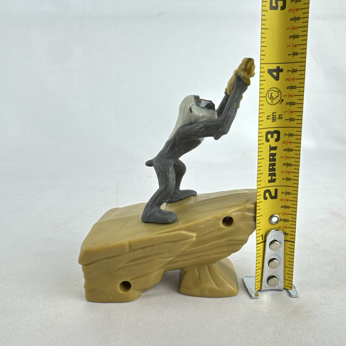 Disney Lion King 2019 McDonald's Happy Meal figure of Rafiki holding baby Simba atop Pride Rock