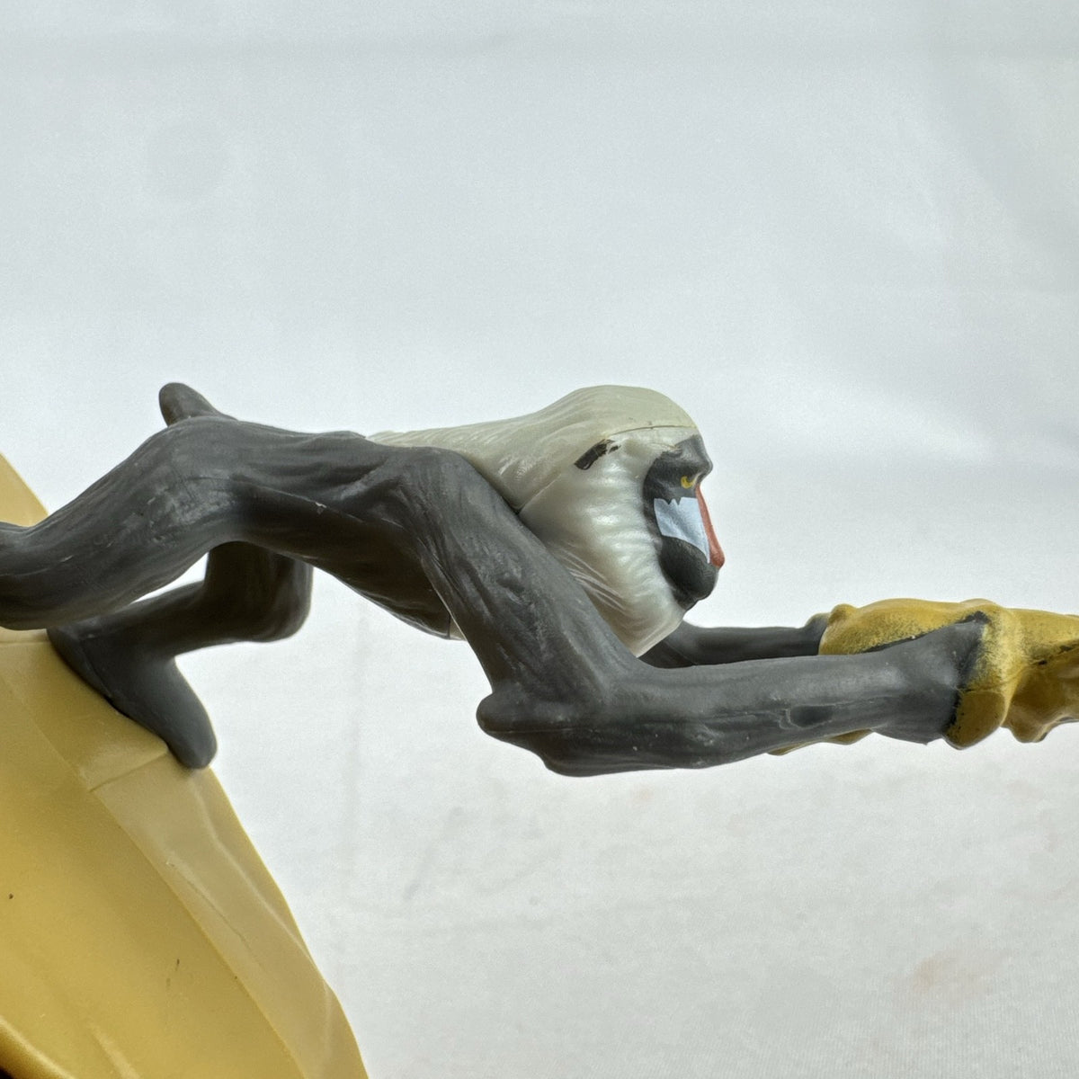 Disney Lion King 2019 McDonald's Happy Meal figure of Rafiki holding baby Simba atop Pride Rock