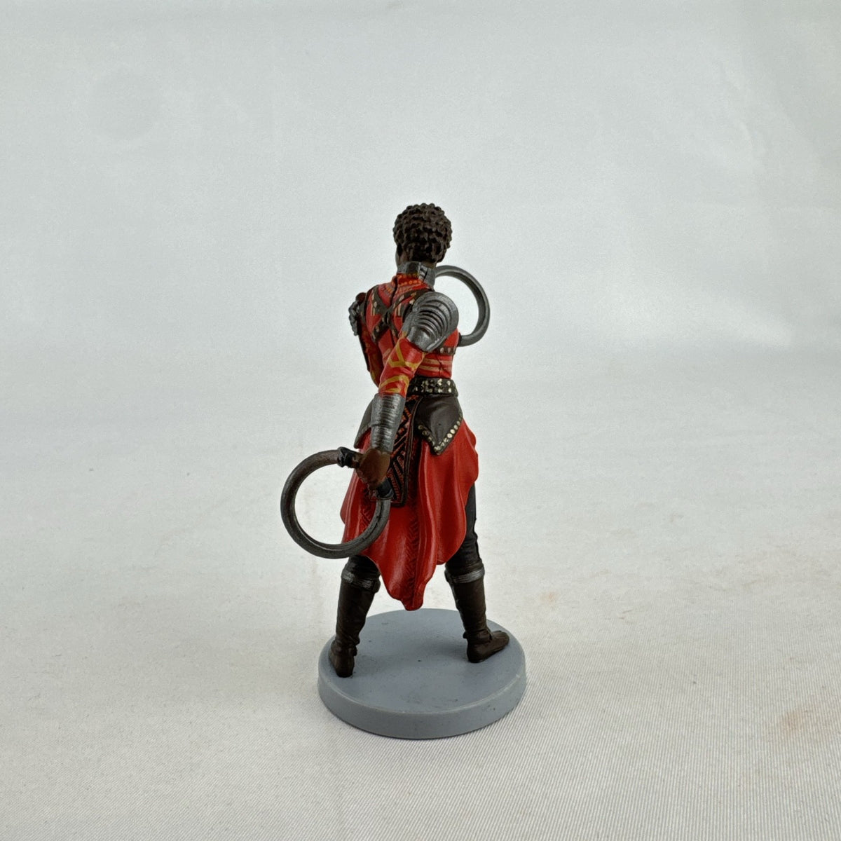 Disney Marvel Black Panther Nakia 3.5-inch PVC figurine holding dual ring blades on display base