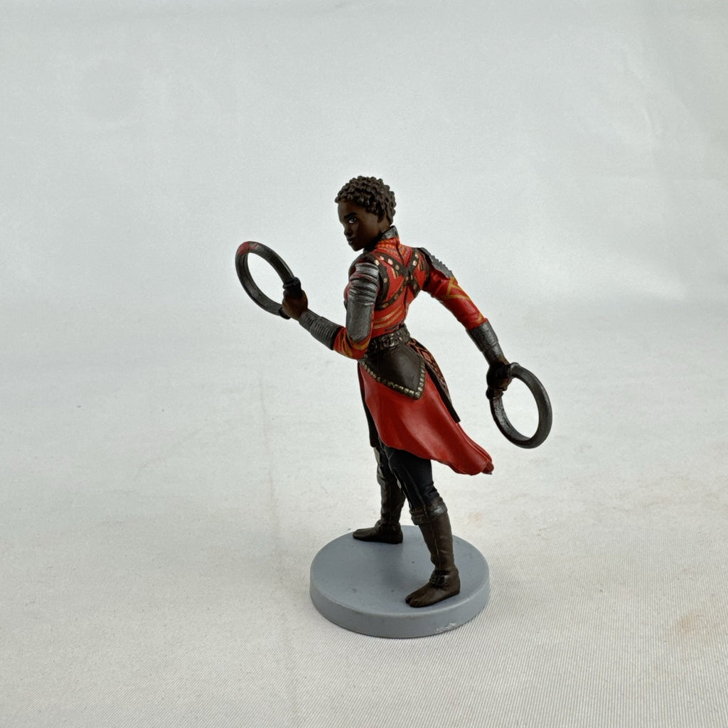 Disney Marvel Black Panther Nakia 3.5-inch PVC figurine holding dual ring blades on display base