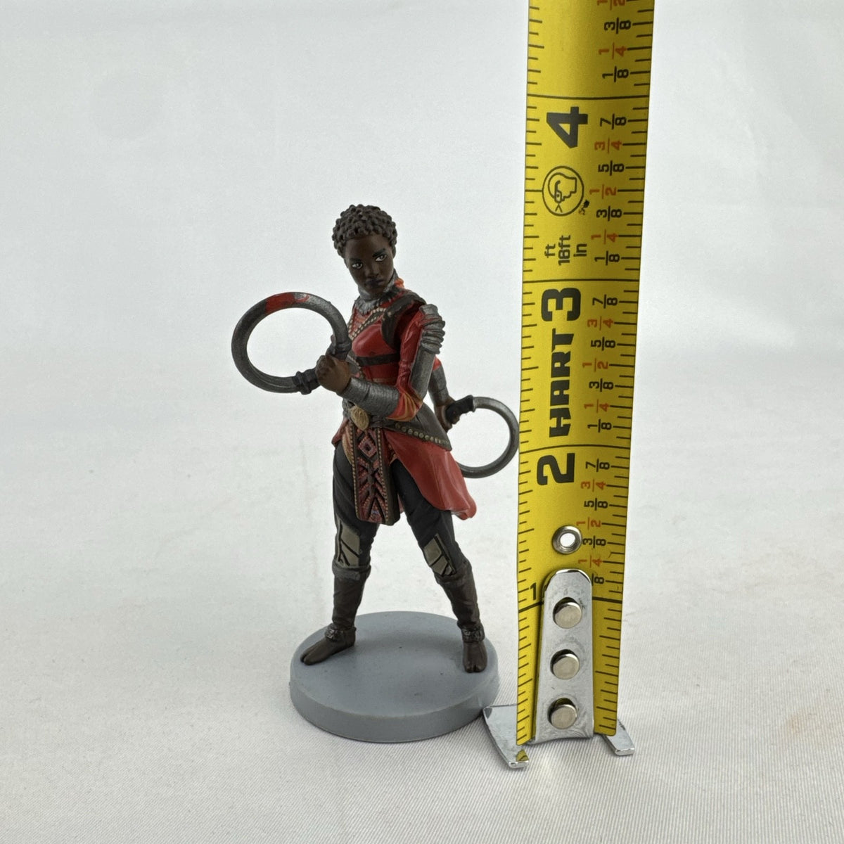 Disney Marvel Black Panther Nakia 3.5-inch PVC figurine holding dual ring blades on display base