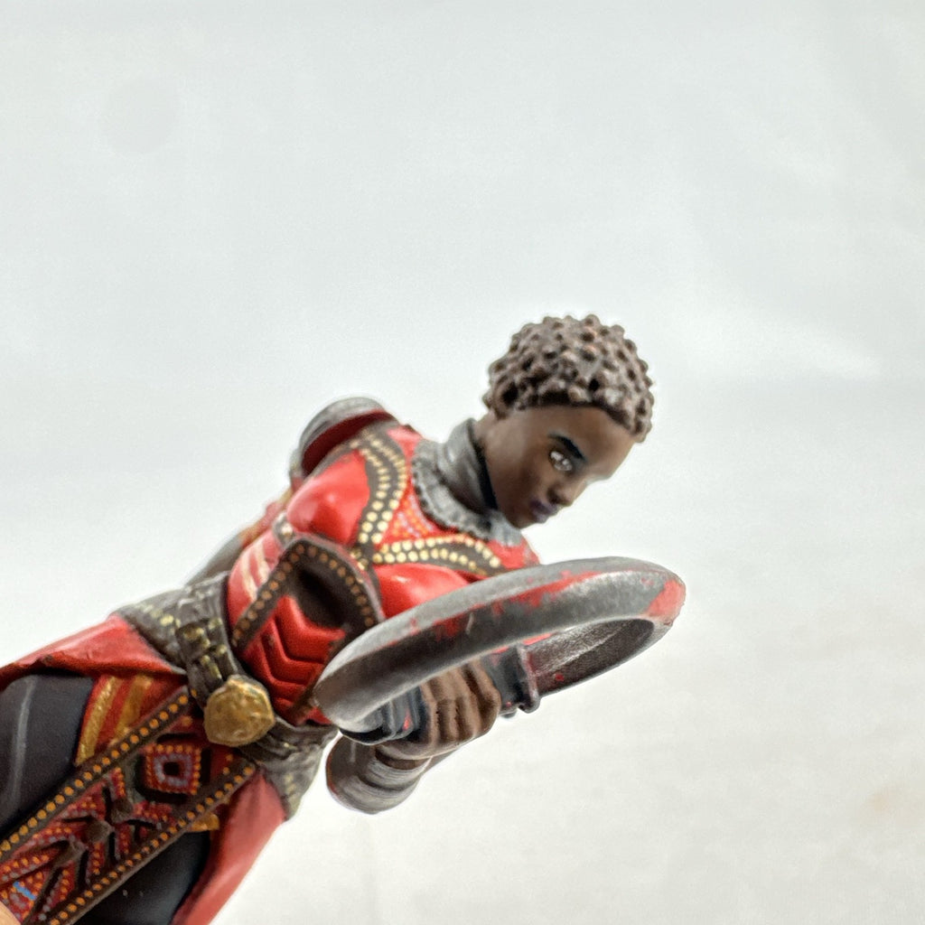 Disney Marvel Black Panther Nakia 3.5-inch PVC figurine holding dual ring blades on display base