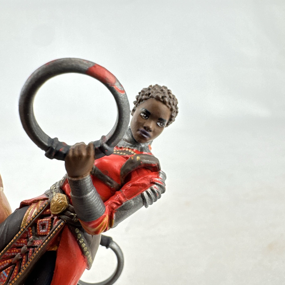 Disney Marvel Black Panther Nakia 3.5-inch PVC figurine holding dual ring blades on display base