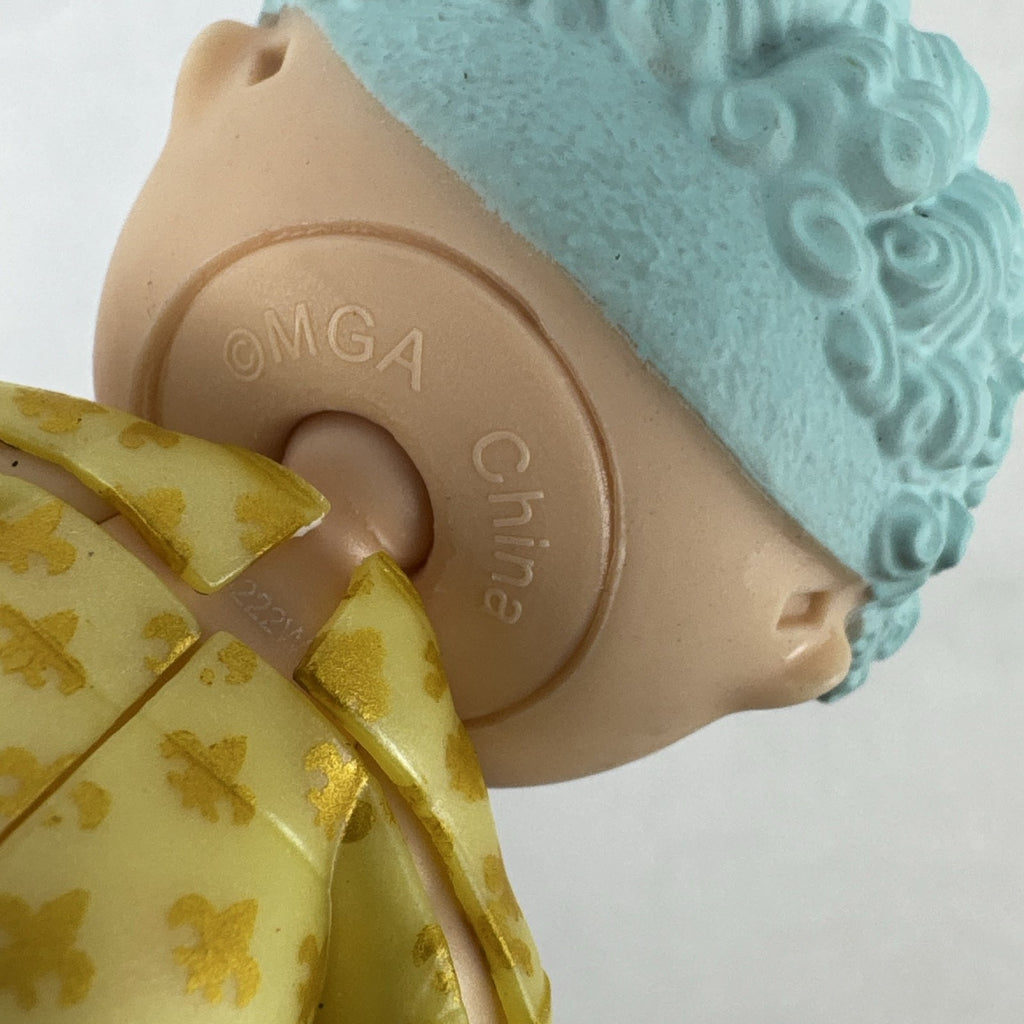 MGA L.O.L. Surprise! Boys Series 1 His Royal Highness 3-inch doll with turquoise curls and gold jacket