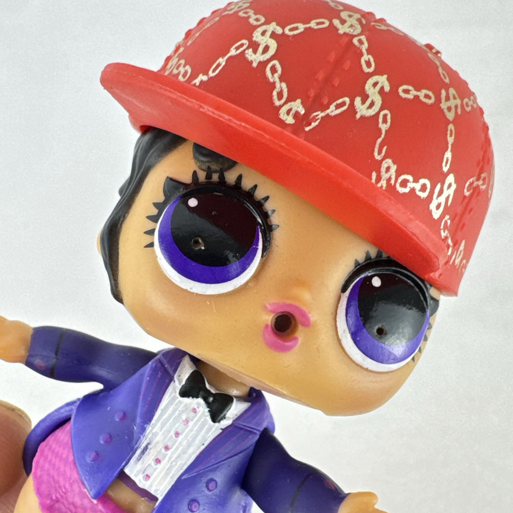 MGA Entertainment L.O.L. Surprise! 3-inch vinyl doll wearing a purple tuxedo suit and red cap