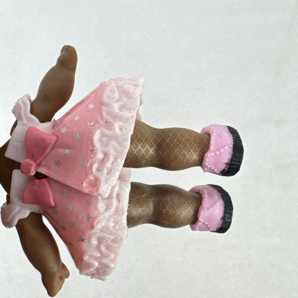 MGA Entertainment L.O.L. Surprise Glitter Series Queen Bee doll with gold glitter hair buns, pink dress, and shoes