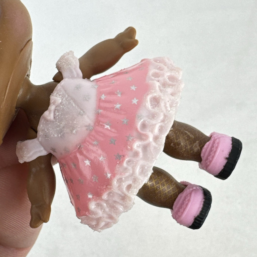 MGA Entertainment L.O.L. Surprise Glitter Series Queen Bee doll with gold glitter hair buns, pink dress, and shoes