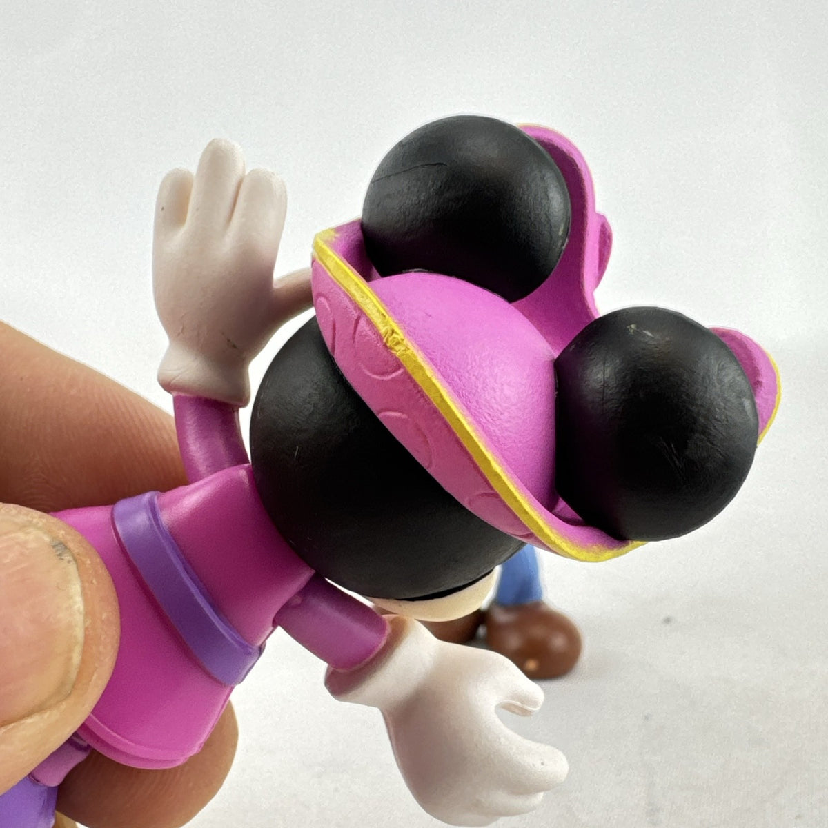 Disney 3-inch molded plastic Mickey Mouse train conductor and Minnie Mouse pirate action figures