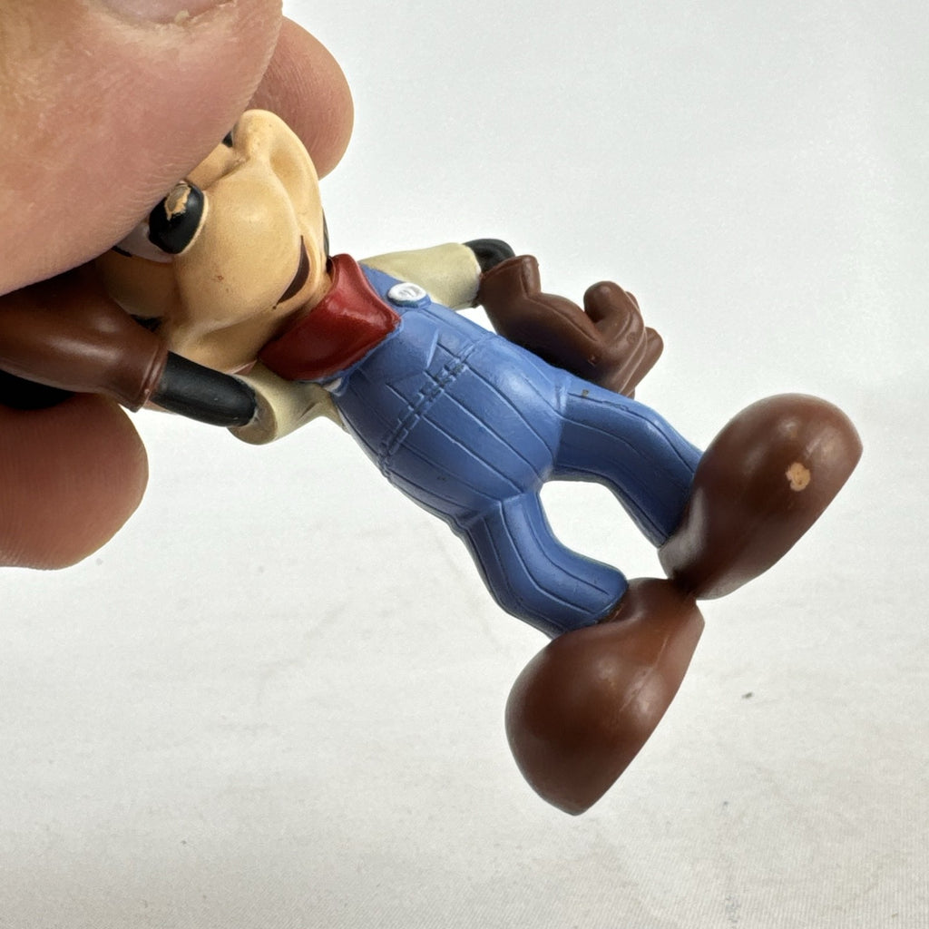 Disney 3-inch molded plastic Mickey Mouse train conductor and Minnie Mouse pirate action figures