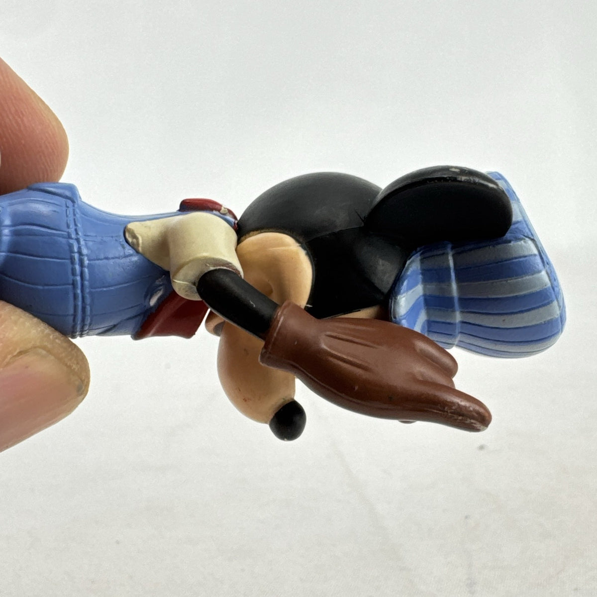 Disney 3-inch molded plastic Mickey Mouse train conductor and Minnie Mouse pirate action figures