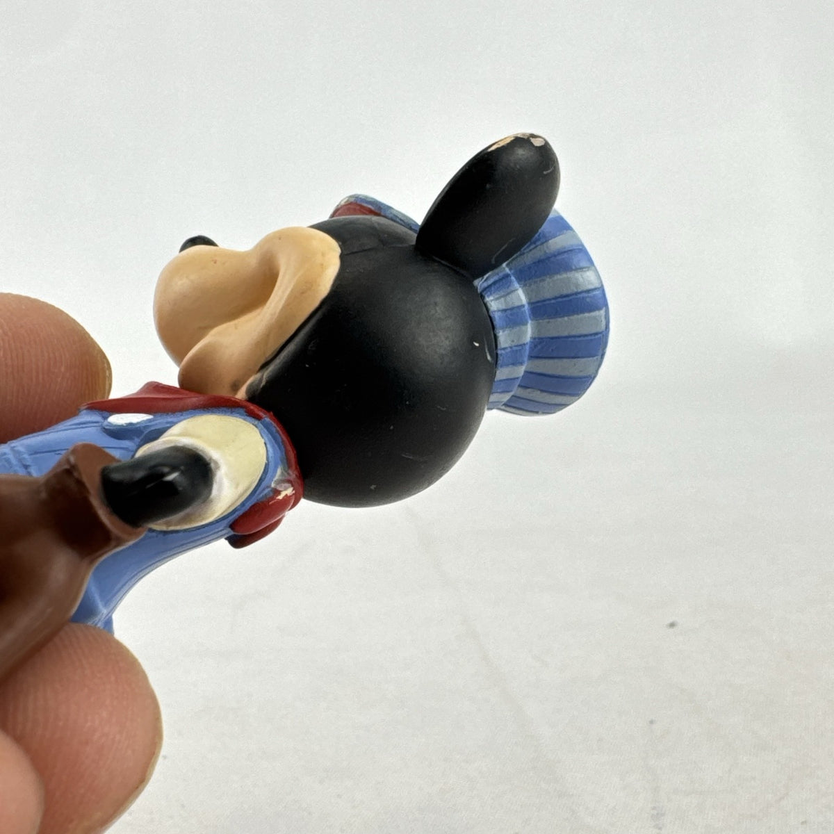 Disney 3-inch molded plastic Mickey Mouse train conductor and Minnie Mouse pirate action figures
