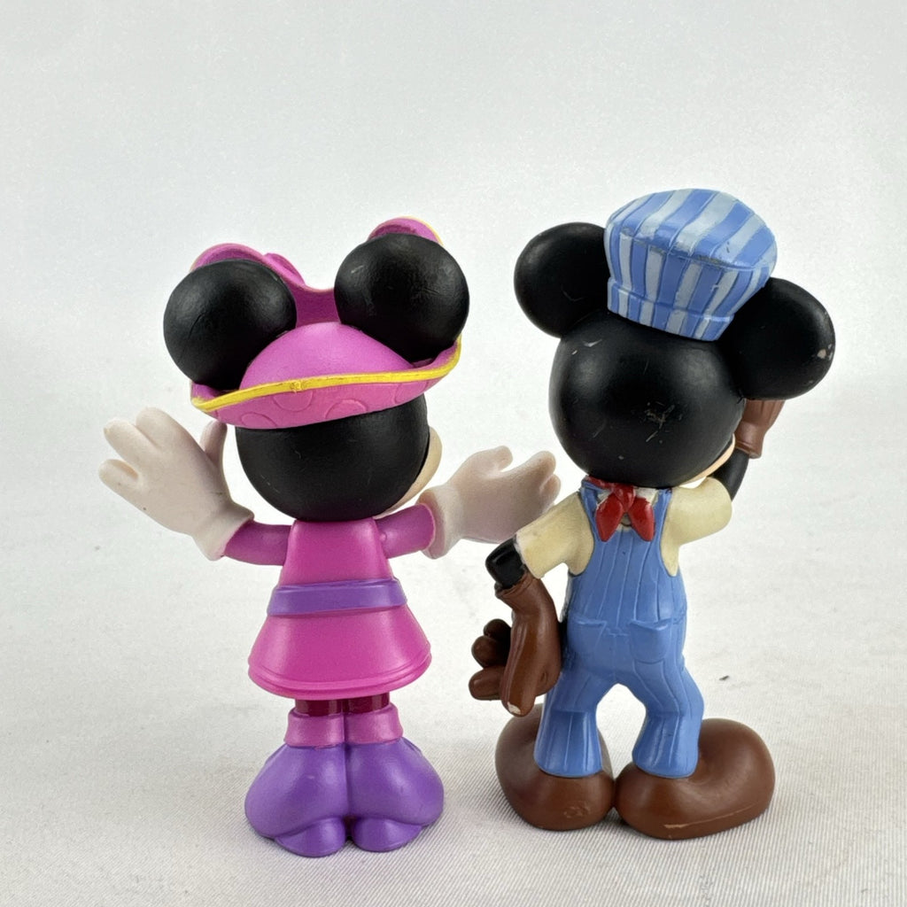Disney 3-inch molded plastic Mickey Mouse train conductor and Minnie Mouse pirate action figures