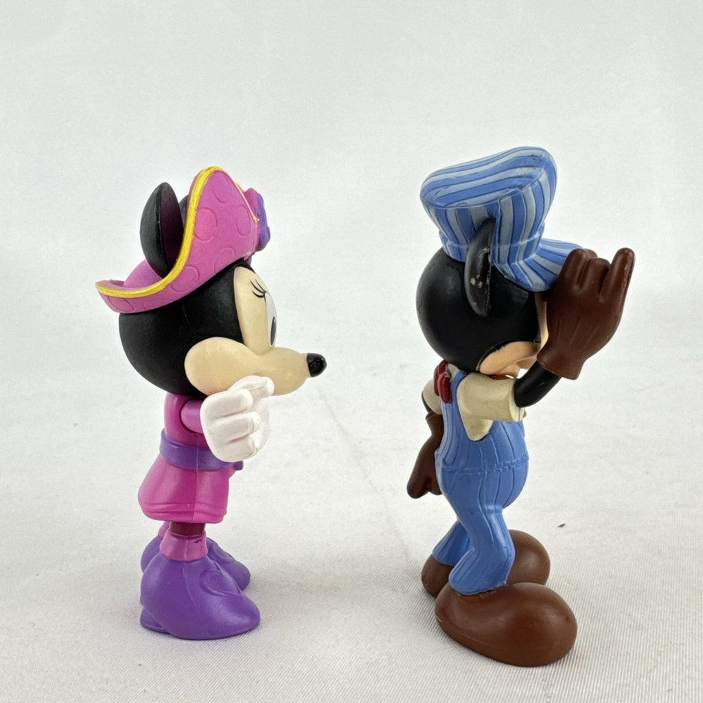 Disney 3-inch molded plastic Mickey Mouse train conductor and Minnie Mouse pirate action figures